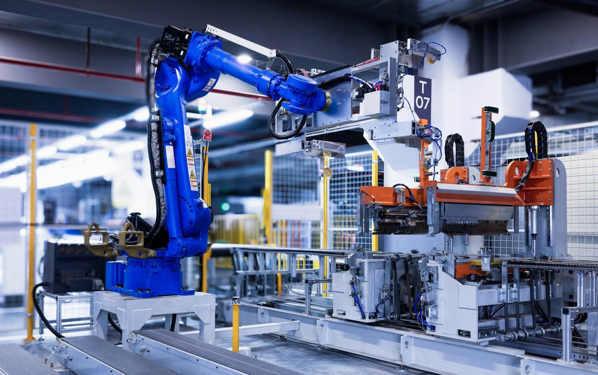 Industrial robot arm working on an automation line